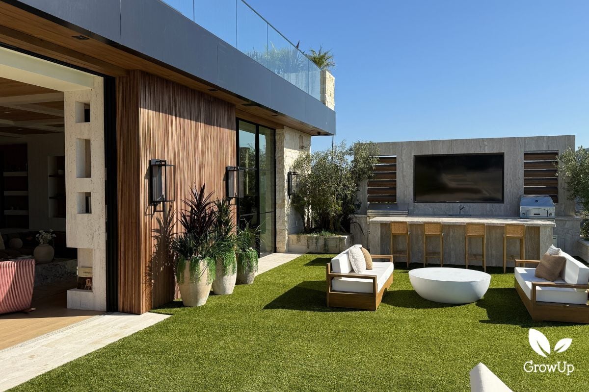 Serenity luxury home outdoor living space with faux greenery pots